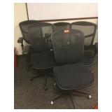 Adjustable rolling office chairs.