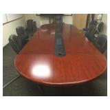16 ft Long Conference table with chairs. 63 in