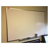 Wall mounted whiteboard, approx 72 inches long