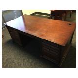 Wood desk w/drawers and keys, approx 6 ft long