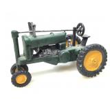 Metal tractor toy.