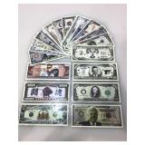 20 fantasy money bills in protective sleeves.
