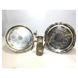 Serving platters and plated carafe.