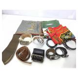 Assorted belts and scarves.