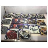 Assorted sports team mousepads.