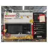 Sharp Carousel microwave in box