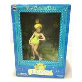 NIB. Disney Vinyl collectible Tinkerbell Doll.