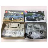 AMT Model cars in boxes.