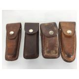 Assorted leather snap front pouches.