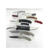 Assorted folding knives and more. As found.