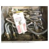 Assorted metal hoses and more