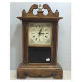 Wood and glass quartz mantle clock. 15x4 in.