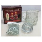 Glassware. Pitcher, candle holders and more.