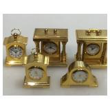 Miniature metal clocks. Different styles. Tallest