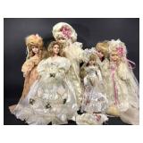 Assorted Porcelain dolls. Wedding attire.