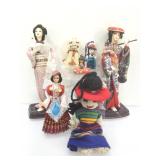 Assorted Collectible dolls.