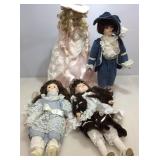 Assorted Porcelain dolls. Some with stands.