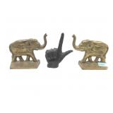 Brass elephant book ends and die cast hand hook.