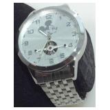 Water resistant,automatic wind Mickey watch.