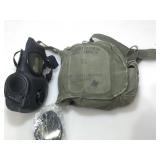 Military face mask in carry bag.