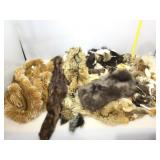 Assorted animal pelts and remnant pieces and more.