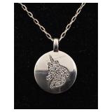 Sterling necklace with circle pendant. Approx 19