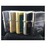 Collection of 5 zippo lighters.