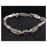 Sterling bracelet with amethyst. Approx 7 in