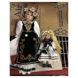 Two dolls 10 inches and 20 inches tall
