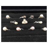 Collection of rings with real pearls. See