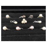 Collection of rings with real pearls. See