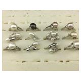 Collection of rings with real pearls. See