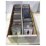 Mixed sports cards with star cards in cases