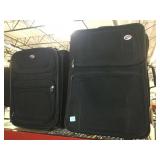 Pair of American Tourister Luggage on wheels