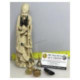 9 in asian figure with metal stamps, pear and