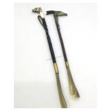 Pair of vintage shoe horns with resin animal