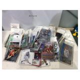 Mixed sports cards in cases