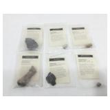 Stone specimens with information cards.