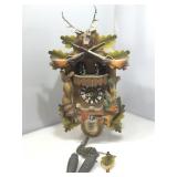 Ornate, German made cuckoo clock. See pictures.