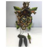 Ornate vintage cuckoo clock. Some damage, horns