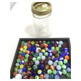 Collection of marbles in Kerr jar.