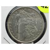 Silver Morgan Dollar in holder