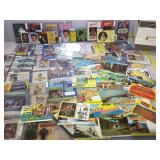 Vintage postcards. Many in sleeves. Some stamps.
