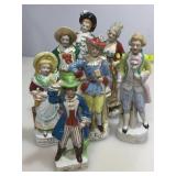 Assorted porcelain figurines made in Japan.