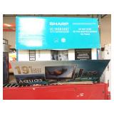 Sharp Aquos 19in tv in box with remote