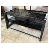 Glass entertainment center, missing one shelf,