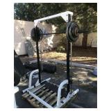 Body Solid Squat Smith Machine with weights and