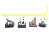 Assorted metal Magnet desk sculptures.