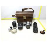 Carry case with Vintage minolta camera and more.