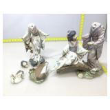 Lladro figures in need of repair.